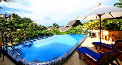 Villa de luxe 4 chambres avec piscine à débordement, chef.