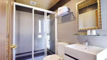 Shower, free toiletries, hair dryer, slippers