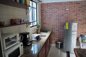 Fridge, microwave, coffee/tea maker, electric kettle