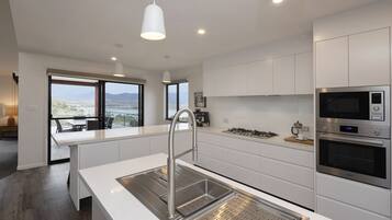 House, 4 Bedrooms, 2 Bathrooms, Lake View | Private kitchen | Full-sized fridge, microwave, oven, stovetop