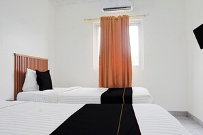 Habitación estándar con 2 camas individuales, 2 camas individuales | Escritorio, wifi gratis y ropa de cama 