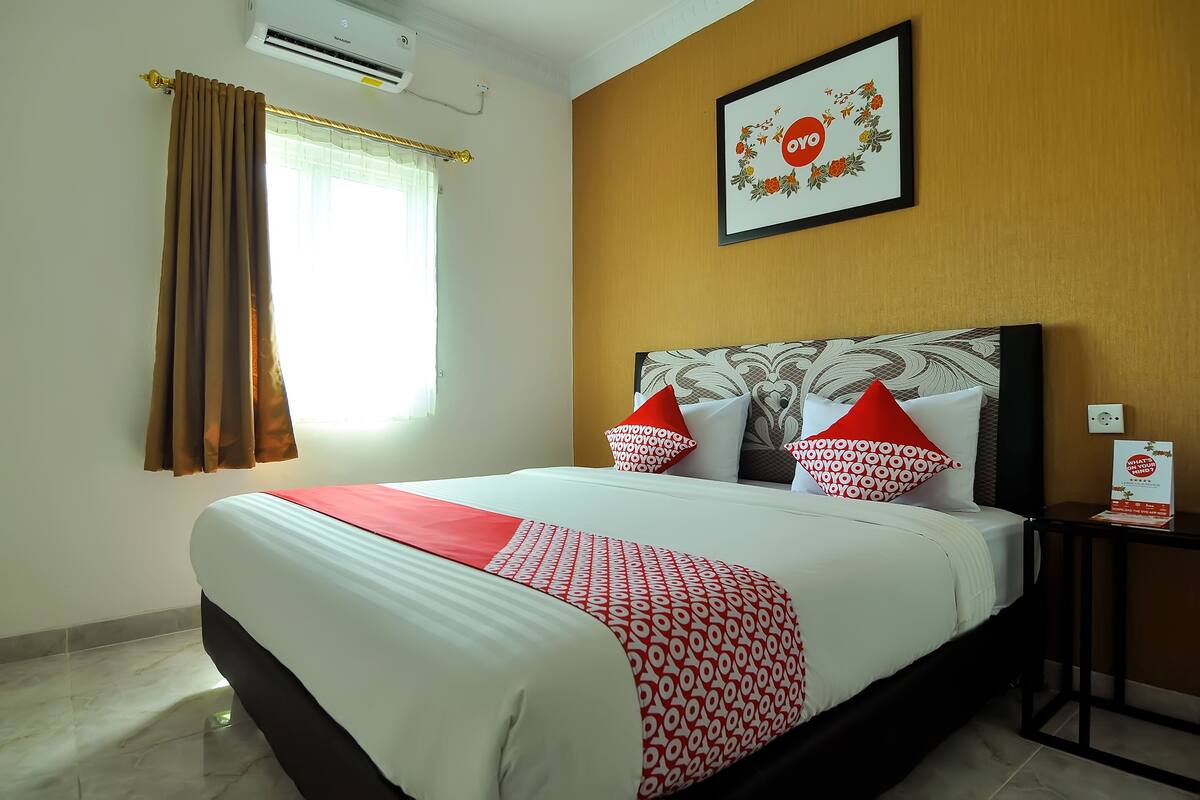 Habitación Deluxe doble, 1 cama doble | Escritorio, wifi gratis, ropa de cama