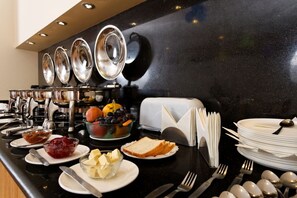 Daily buffet breakfast (INR 450 per person)