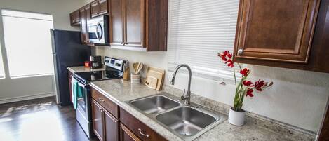 Casa (2 Bedrooms) | Cocina privada | Refrigerador, microondas, horno y lavavajillas