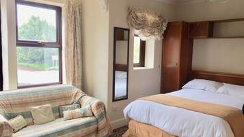 Family Room (with Shower) | Iron/ironing board, free WiFi, bed sheets