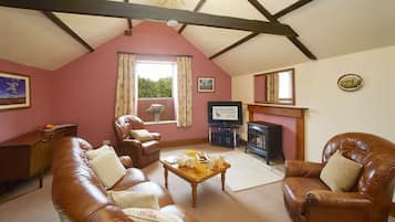 Pye Corner- 2 Bedroom Cottage | Living room | Flat-screen TV