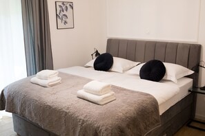 Premium bedding, memory foam beds, in-room safe, desk