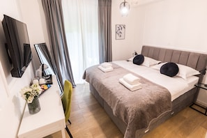 Premium bedding, memory-foam beds, in-room safe, desk
