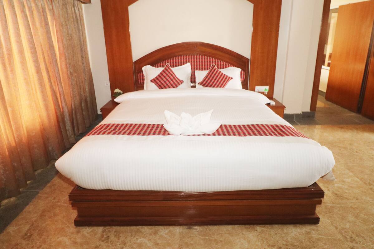 Family Room | Premium bedding, desk, laptop workspace, soundproofing