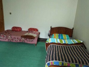 Business Triple Room, Courtyard View | Desk, laptop workspace, blackout curtains, iron/ironing board