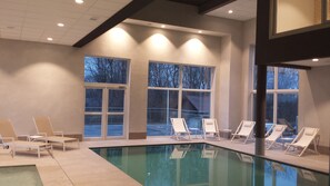 Indoor pool, open 8:00 AM to 8:00 PM, pool loungers