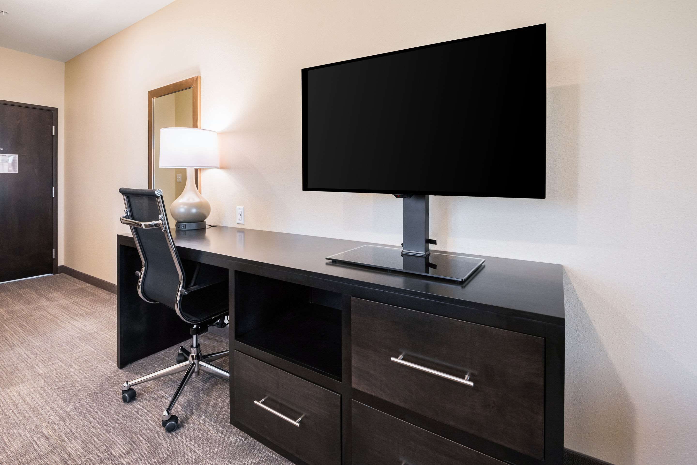 suite, 1 king bed with sofa bed, non smoking, balcony | desk, laptop workspace, blackout curtains, iron/ironing board