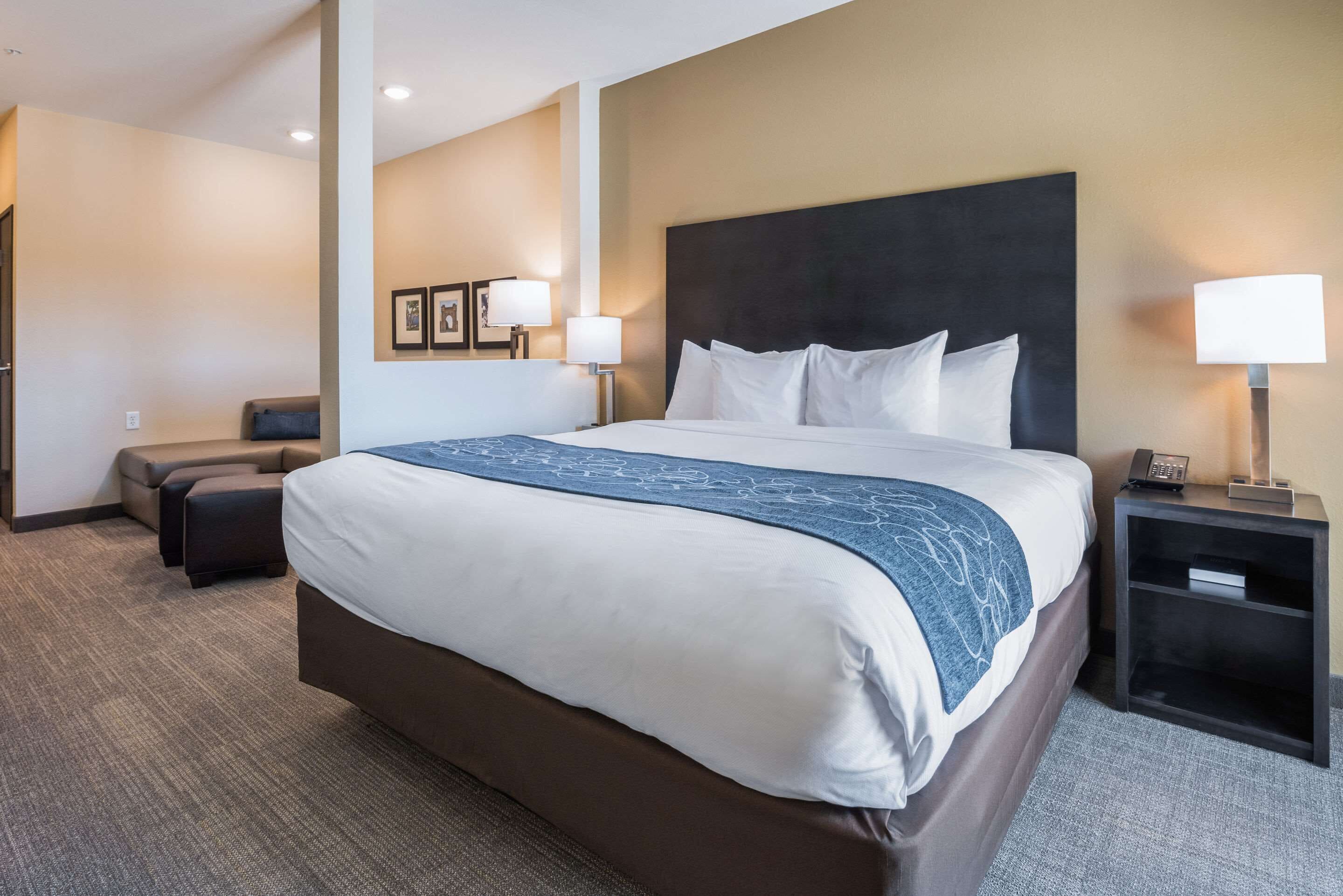 Desk, laptop workspace, blackout drapes, iron/ironing board