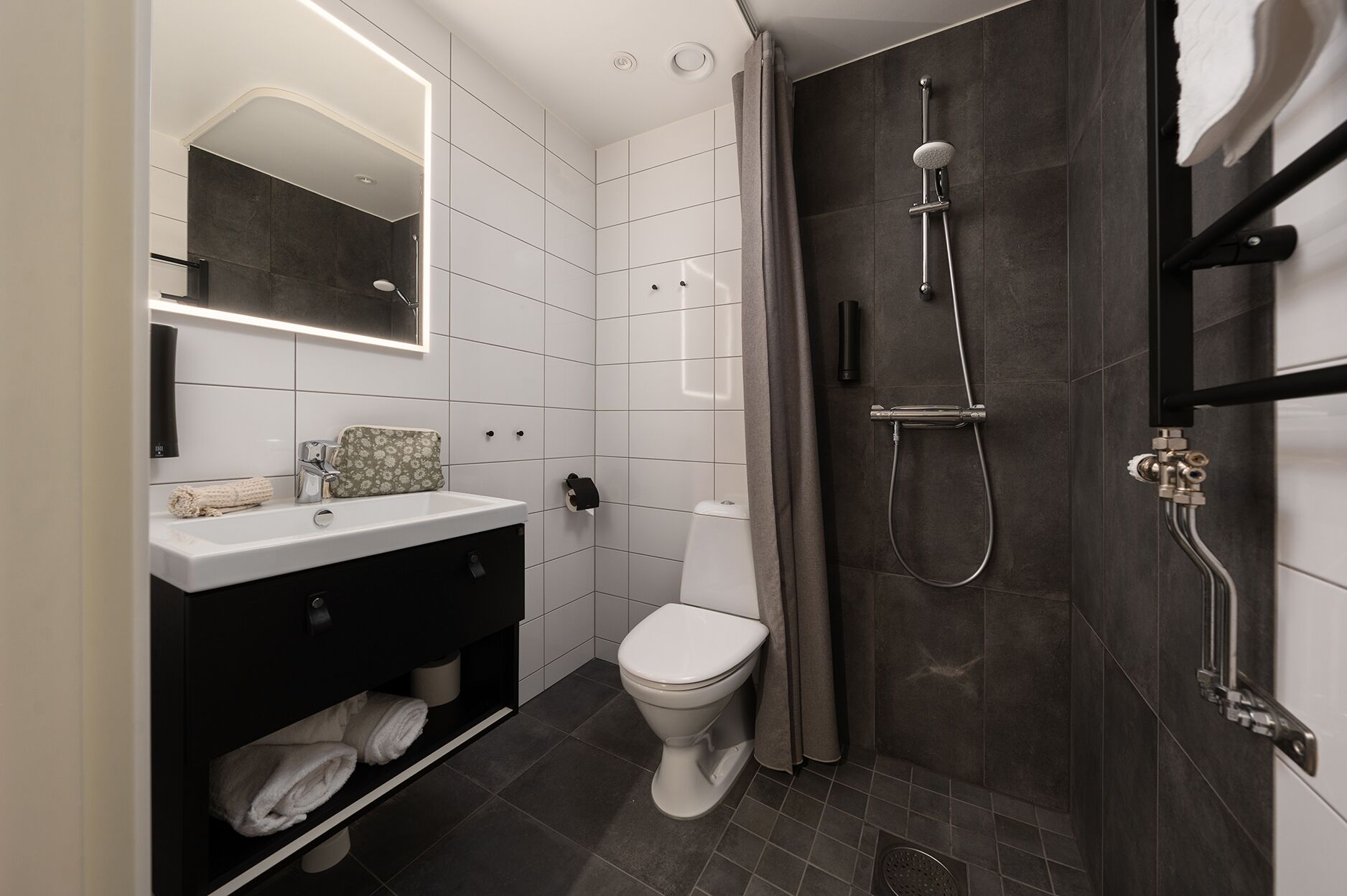 economy double room | bathroom | shower, hair dryer, towels, soap