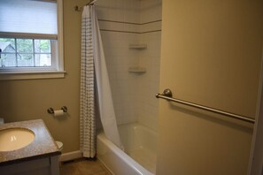 Combined shower/bathtub, hair dryer