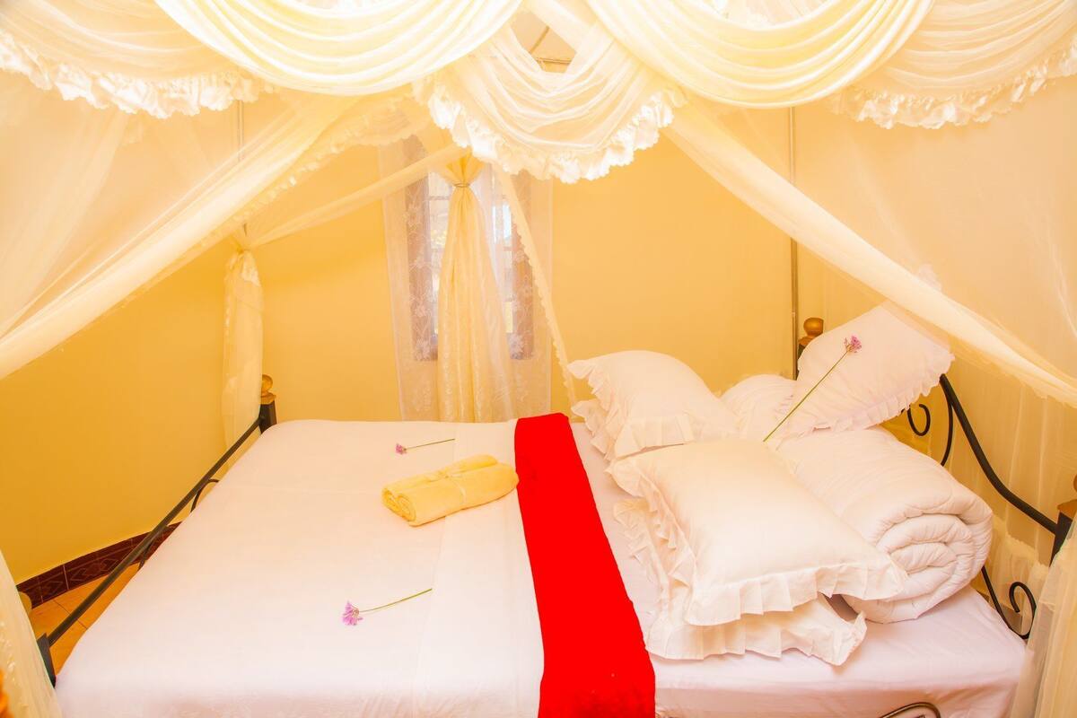 Luxe beddengoed, een kluis op de kamer, beddengoed