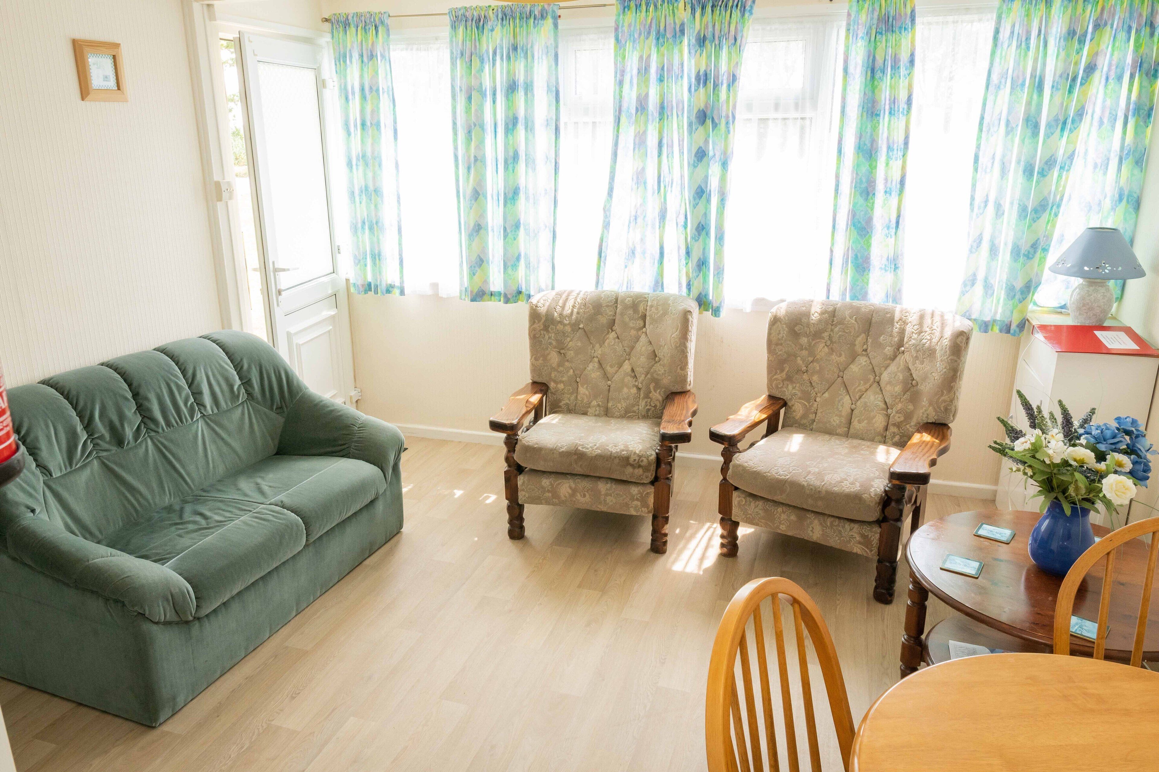 Chalet, Multiple Beds | Living room | 30-inch TV with cable channels