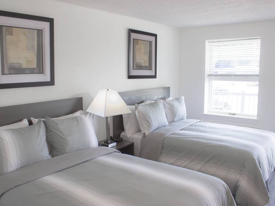 Chambre Double Deluxe, 2 lits doubles, non-fumeurs | Fer et planche à repasser, Wi-Fi gratuit, draps fournis