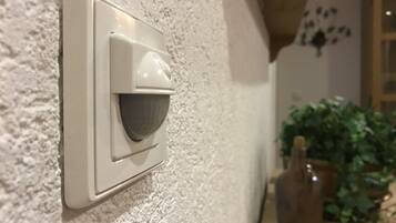 A wall-mounted security camera.