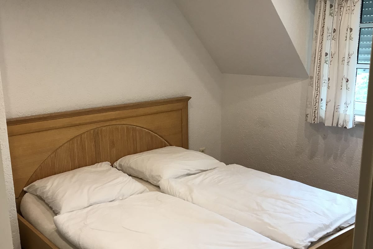 Premium bedding, down duvets, desk, laptop workspace