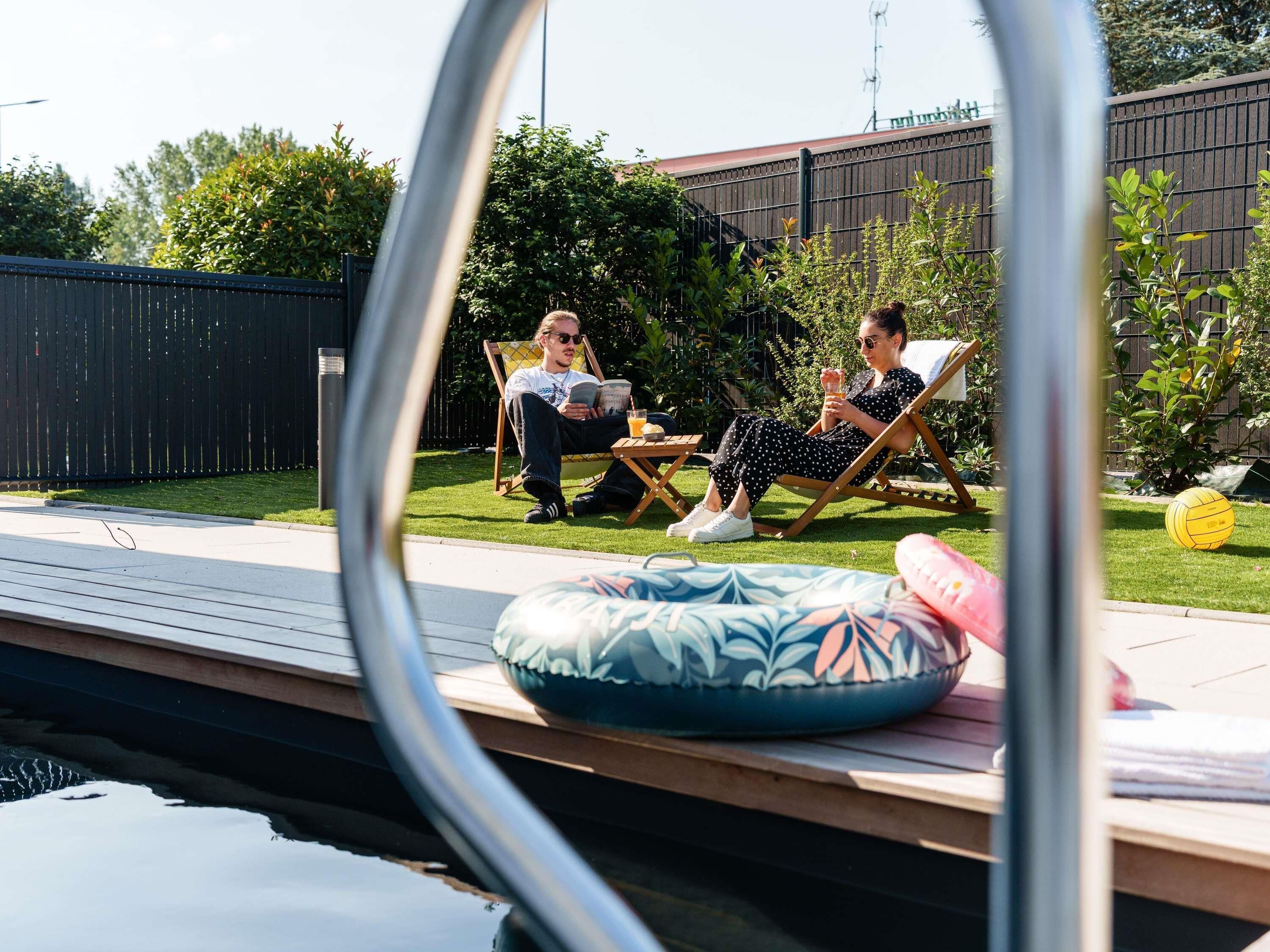Seasonal outdoor pool, open 10:00 AM to 9:00 PM, free cabanas