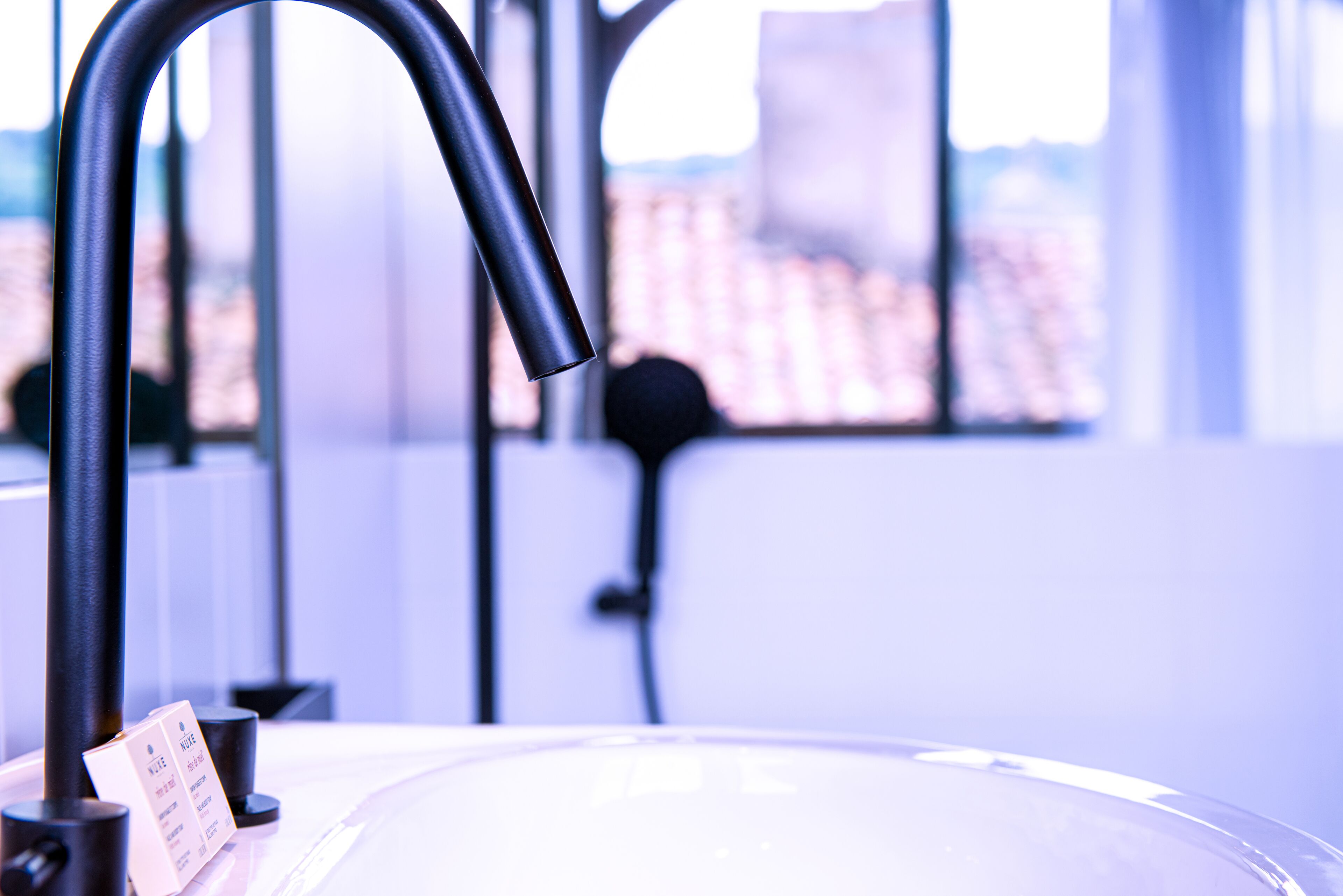 eco-friendly toiletries, hair dryer, bathrobes, slippers