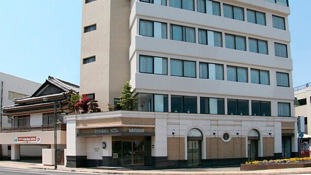 A multi-story Hakusan Hotel with a modern facade, large windows, and a prominent sign at the top. - Shimabara Hakusan Hotel (Shimabara)