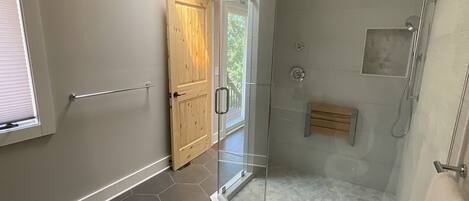 Combined shower/tub, hair dryer, towels, soap