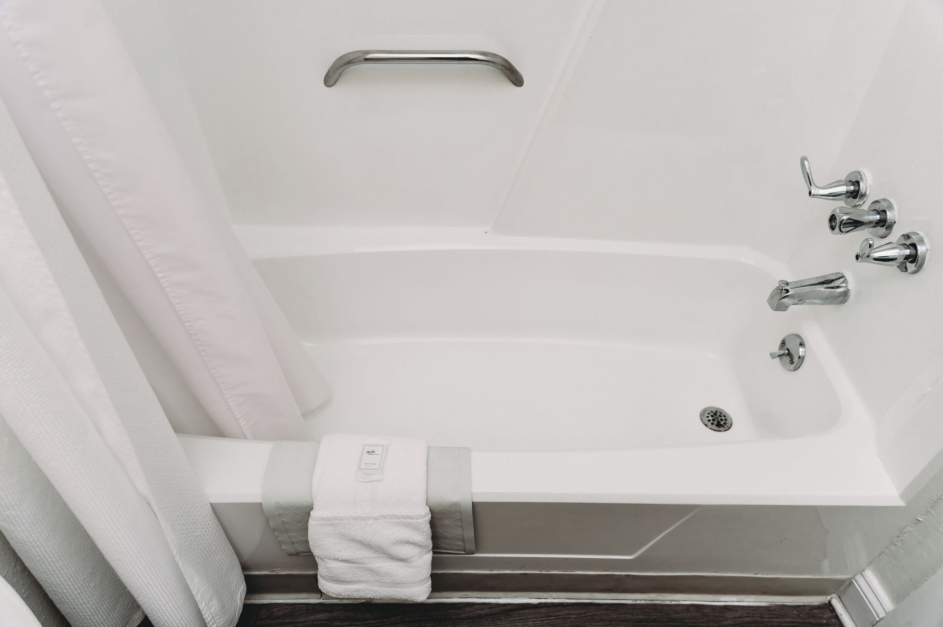 eco-friendly toiletries, hair dryer, towels, soap