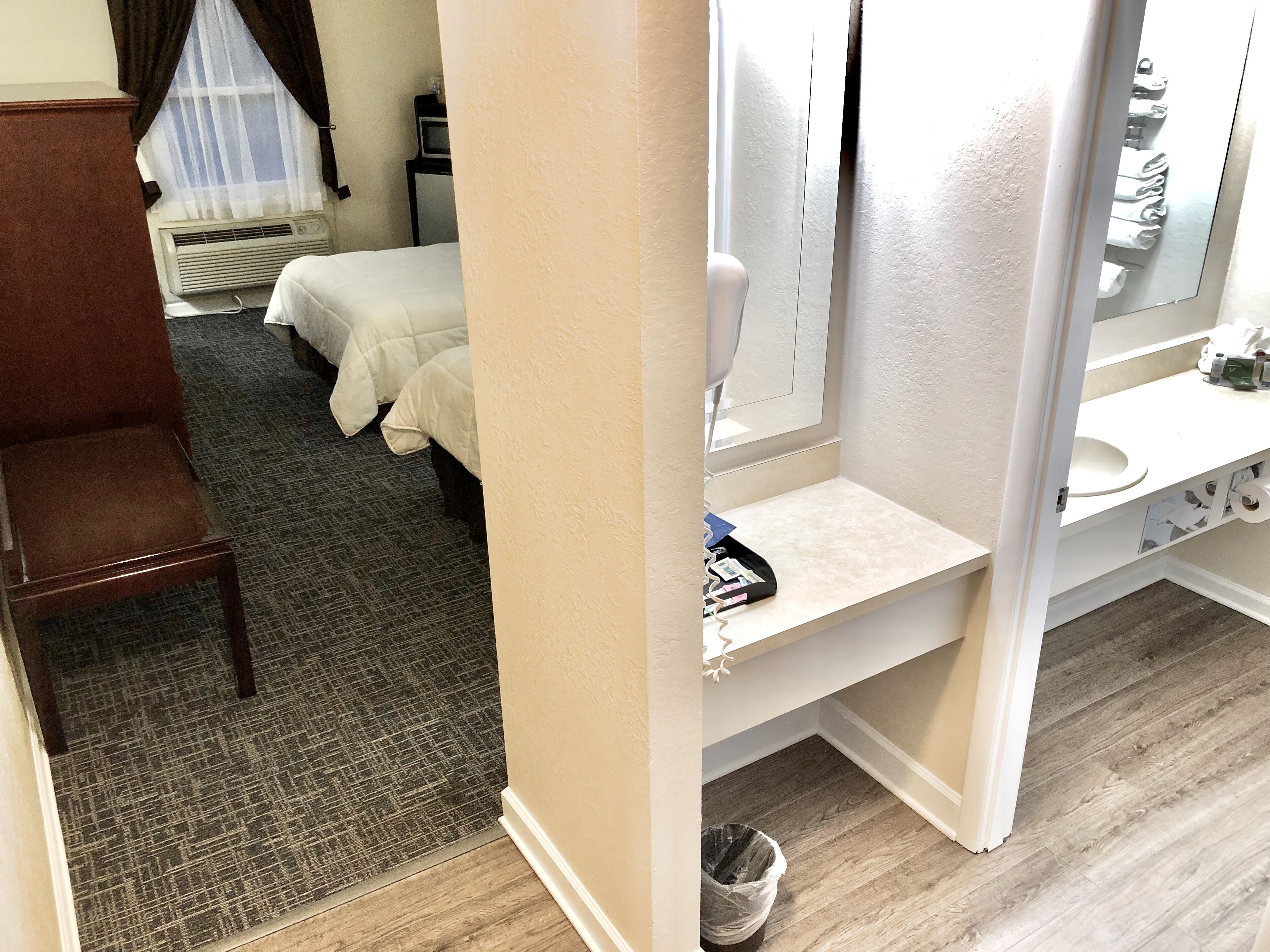 double room, 2 double beds | desk, laptop workspace, blackout curtains, iron/ironing board