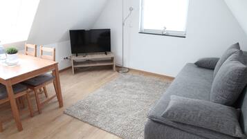 Apartment (Wendlingen) | Living area | Flat-screen TV, Netflix, streaming services