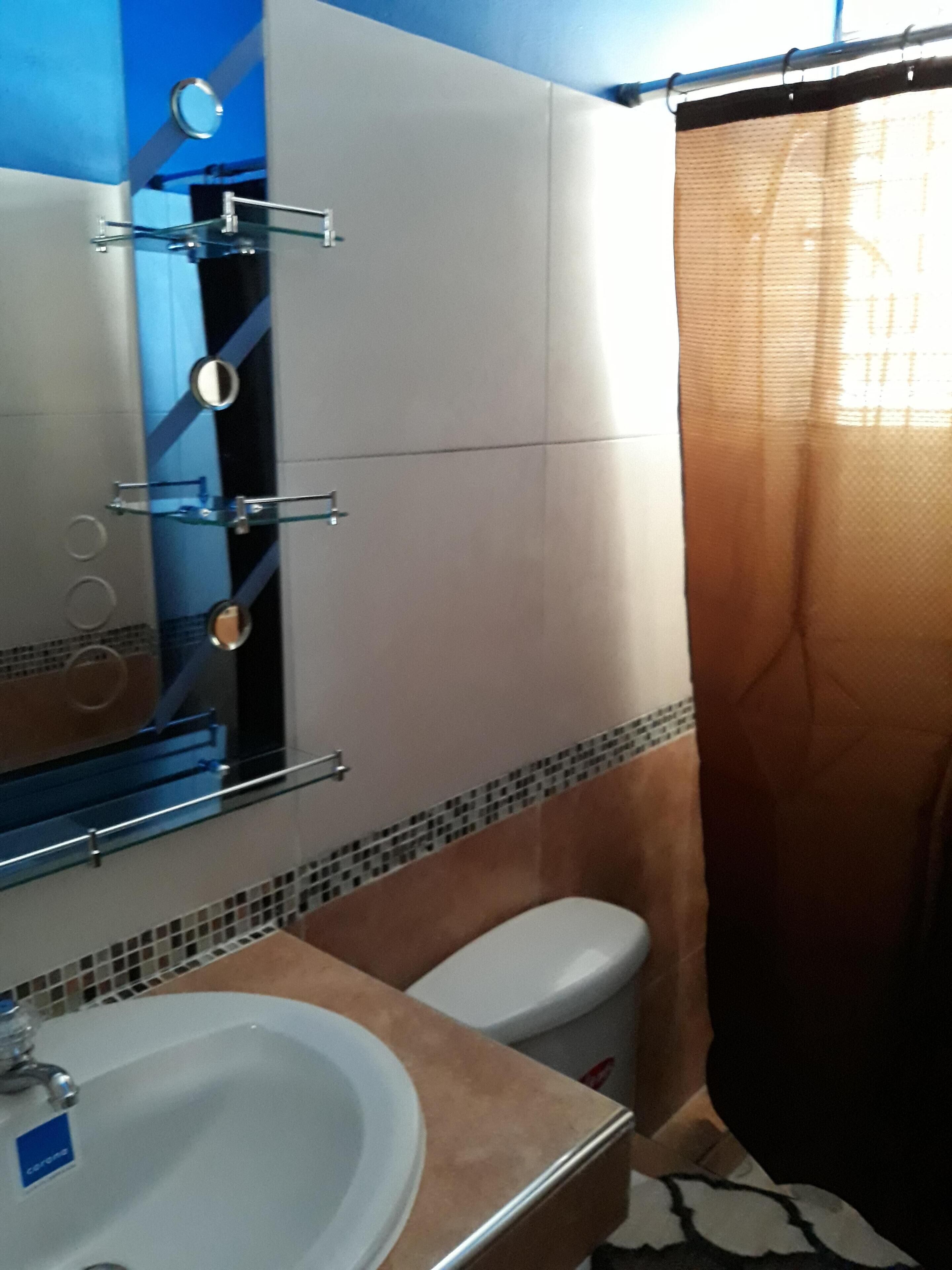 Shower, towels, soap, shampoo