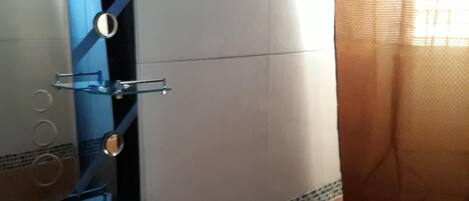 Shower, towels, soap, shampoo