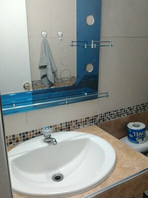 Shower, towels, soap, shampoo