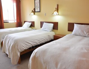 Quadruple Room | Wifi gratis y ropa de cama