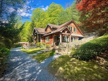 The Lodge has rustic timber frame & mission style themes to blend w/nature.