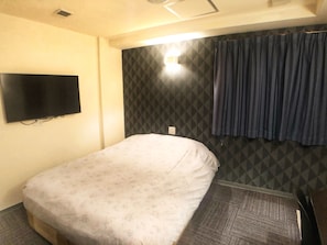 Down comforters, desk, blackout drapes, free WiFi
