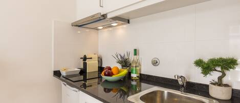 Fridge, microwave, stovetop, coffee/tea maker