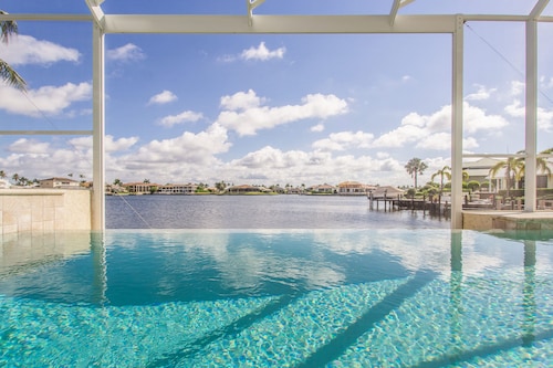Elegant Home with WideWater Views & Walk to Beach!