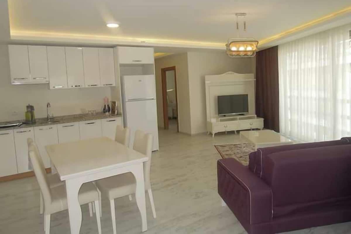 Luxury Apartment, Kitchen | In-room dining