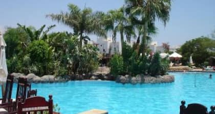 Appartement dans une résidence paysagée avec piscines