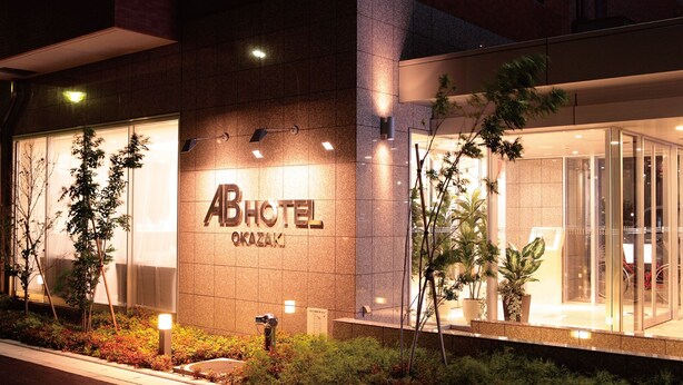 A hotel exterior with a prominent sign reading 'ABHOTEL OKAZAK.' - Ab Hotel Okazaki (Okazaki)