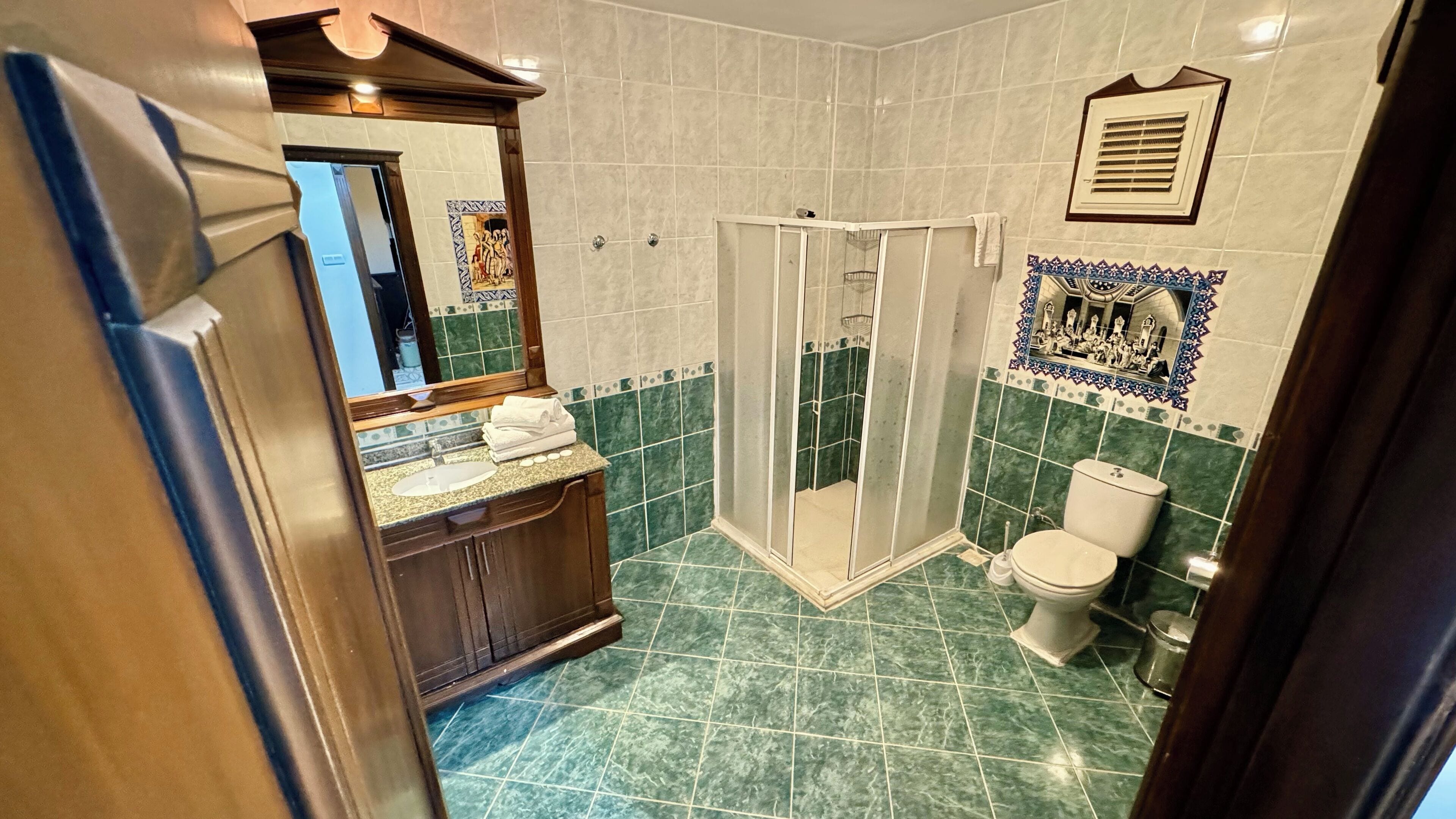 shower, free toiletries, hair dryer, slippers