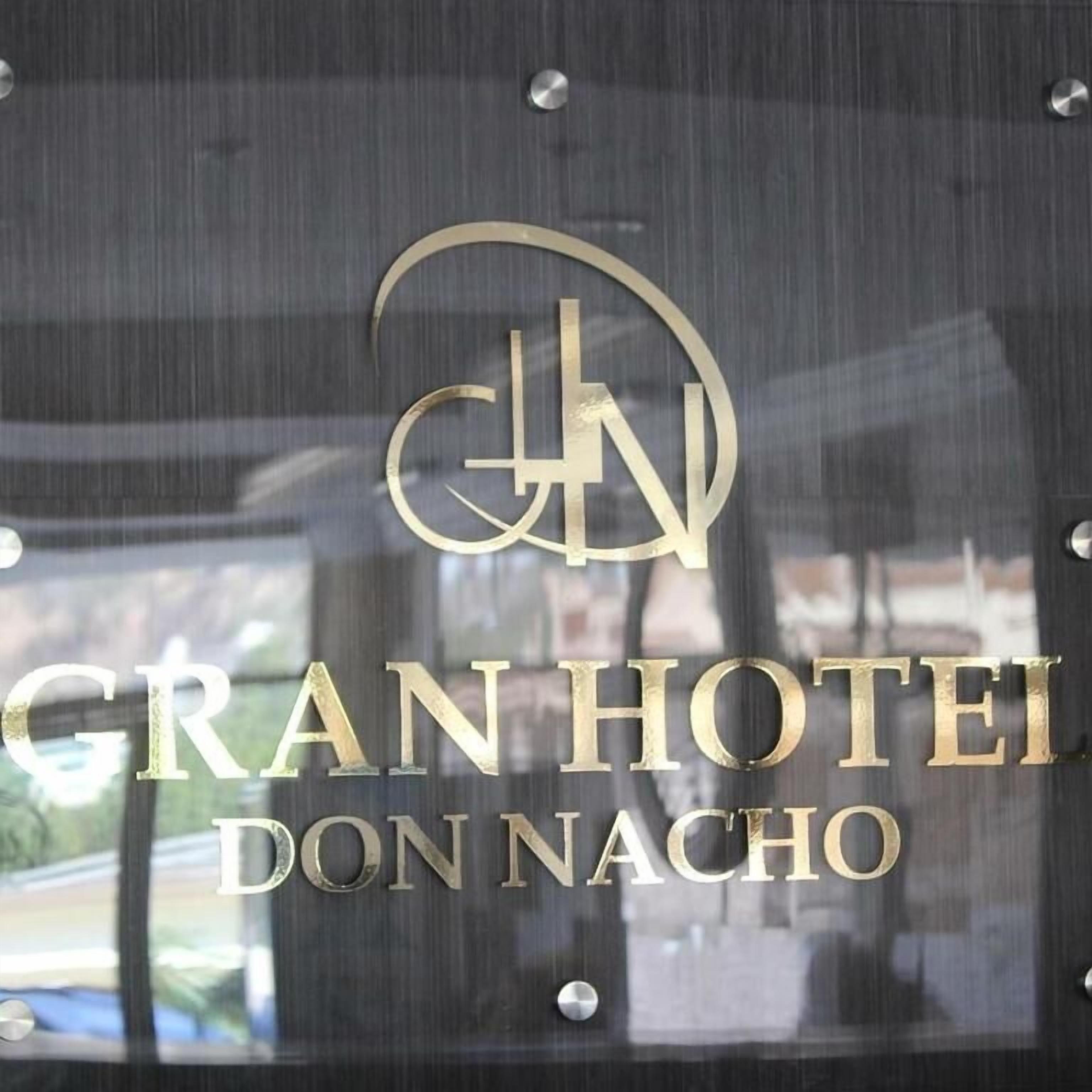 A hotel sign with the name "GRAN HOTEL DON NACHO".