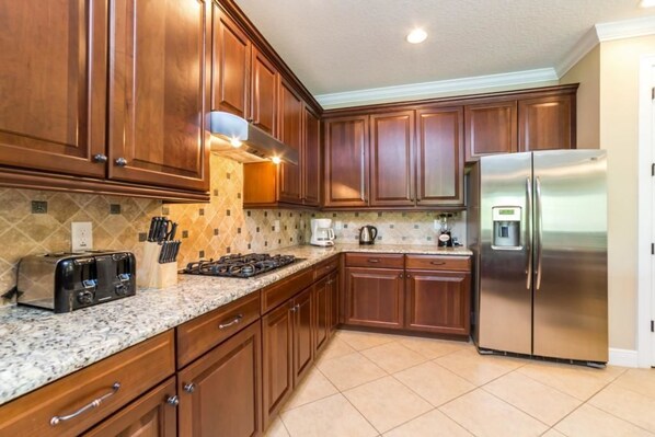 House, Multiple Beds (1041CP Amazing Reunion Resort Golf Co) | Private kitchen | Fridge, microwave, oven, stovetop