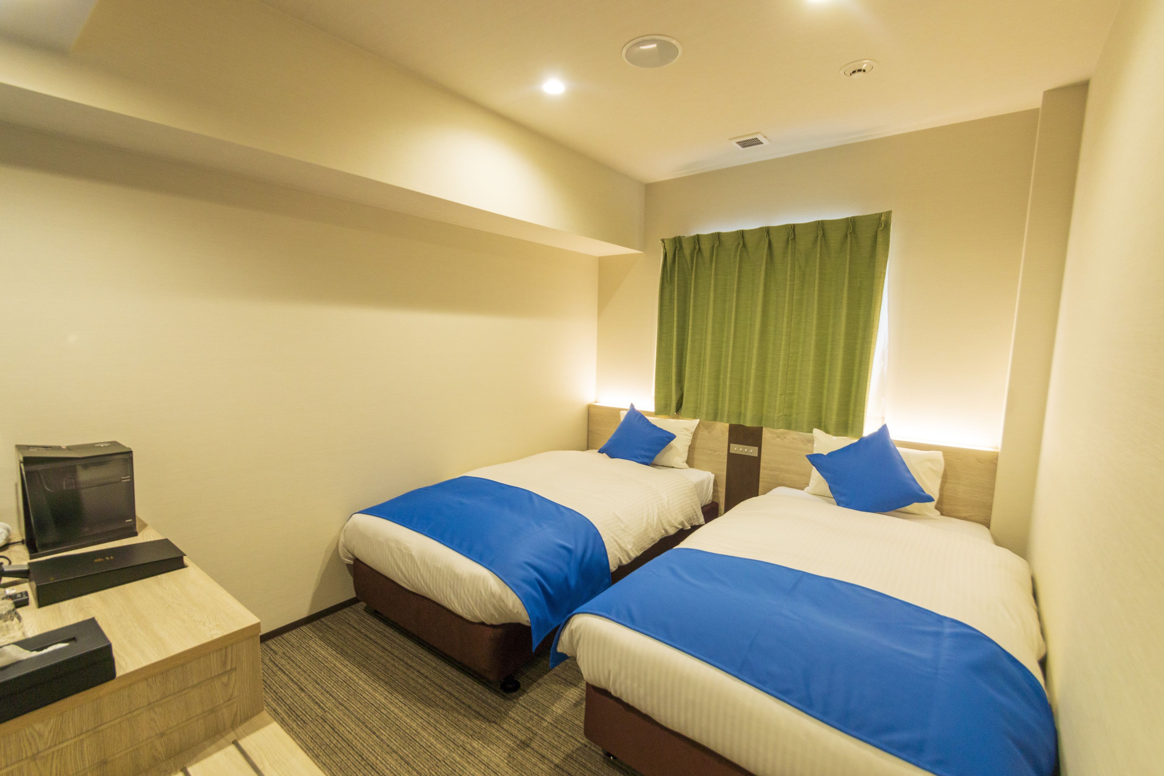 standard twin room, multiple beds | 1 bedroom, down duvets, desk, blackout curtains