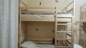 Bed in 14-bed Mixed Dormitory Room | Iron/ironing board, bed sheets - Cinema Hostel (Lviv)