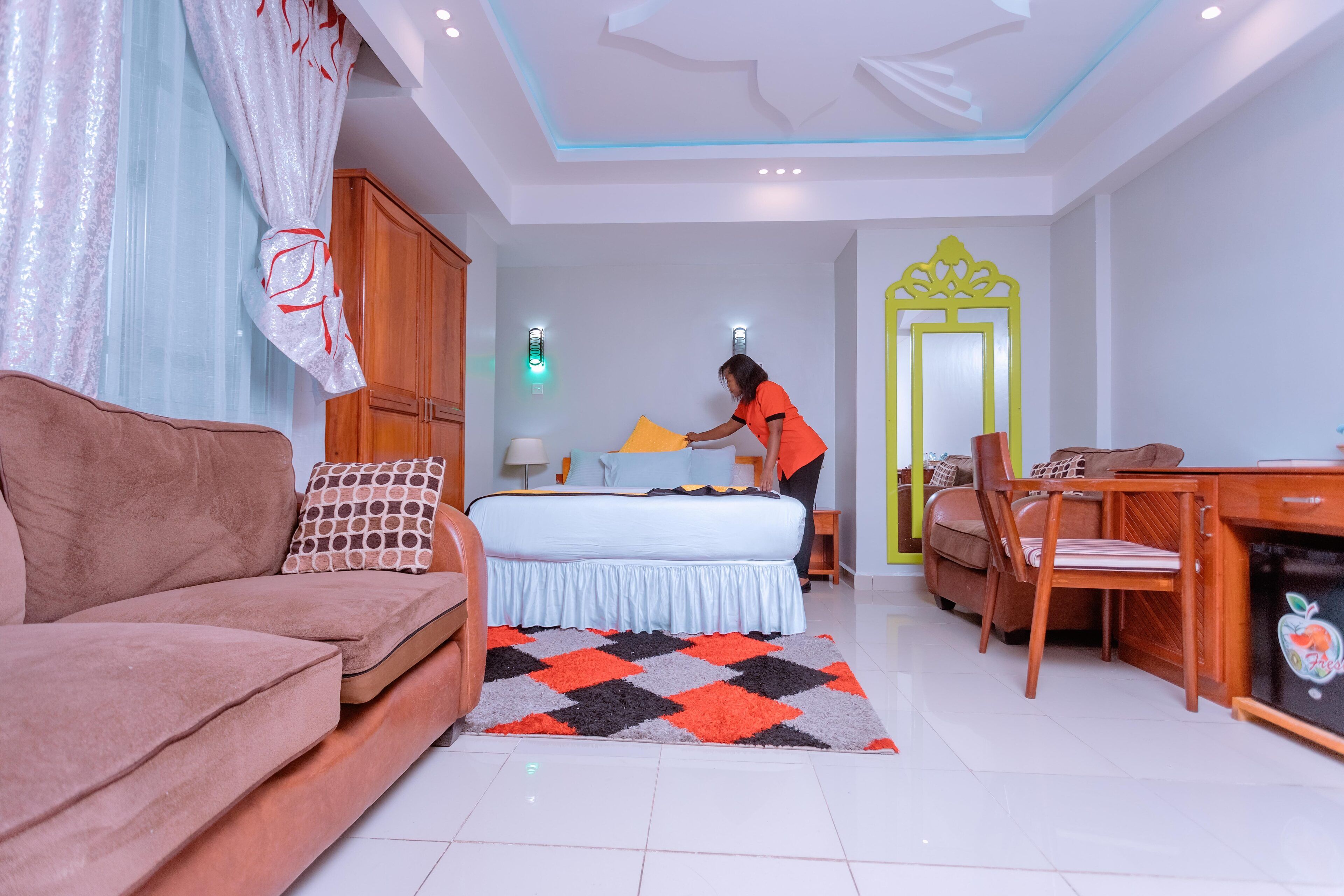 Deluxe Room | Laptop workspace, blackout curtains, rollaway beds, free WiFi