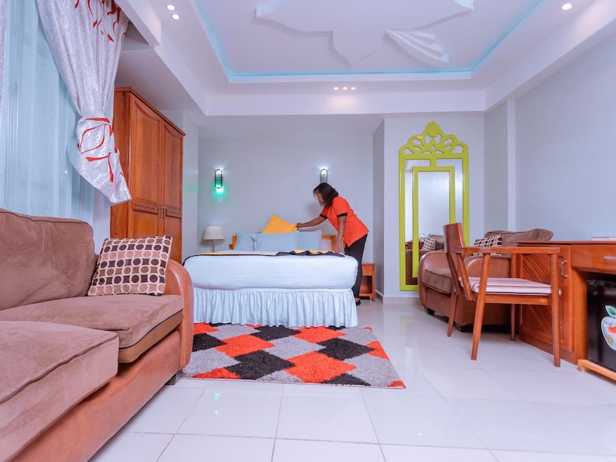 Deluxe Room | Laptop workspace, blackout curtains, rollaway beds, free WiFi