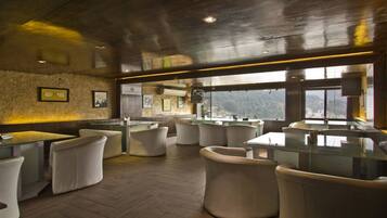 Breakfast, lunch, dinner served; local and international cuisine